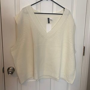 White sweater vest